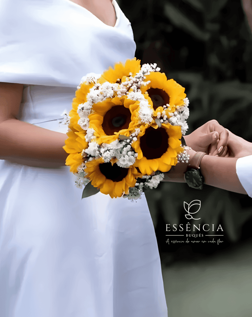 Buquê de girassol amarelo com folhagem e fita decorativa, ideal para casamento civil e religioso.
